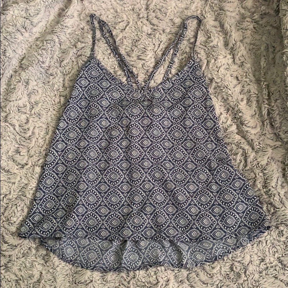 blue crisscrossing tank